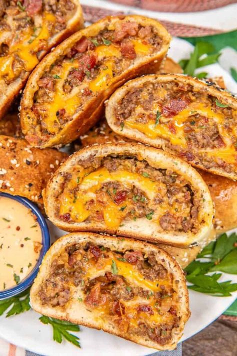 Garbage Bread Recipe - Get ready to dive into the ultimate comfort food! This recipe combines all your favorite cheeseburger flavors, including ground beef, crispy bacon, hamburger seasoning, Worcestershire sauce, and a melty blend of Velveeta and cheddar cheese, all rolled up in a pizza dough and topped with everything bagel seasoning. This savory delight is a crowd-pleaser, perfect for game day, family gatherings, or anytime you're craving a satisfying, cheesy treat. Garbage Bread Recipe, Garbage Bread, Chicken Honey, Everything Bagel Seasoning, Bagel Seasoning, Plain Chicken, Homemade Pizza Dough, Pizza Recipes Dough, Pizza Hut