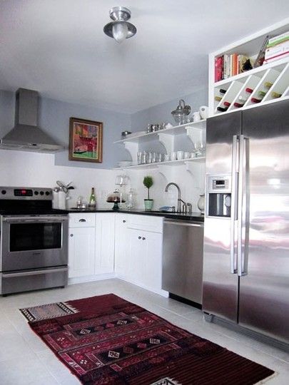 Will be taking the doors off the cupboards above refrigerator to make room for wine and extra cookbooks!  Great use of space! Space Above Fridge, Storage Above Fridge, Above Refrigerator, Top Of Fridge, Above Fridge, Above The Fridge, Refrigerator Ideas, Quick Projects, Wine Bottle Storage