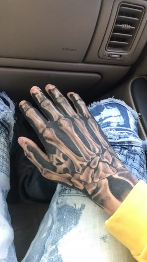 Skeleton tattoo Tattoo Ideas For Men Skeleton, Front Next Tattoo Men, Hand Tattoos For Guys Skeleton, Skeleton Hand Tattoo Men, Hand Tattoos Ideas For Men, Half Skeleton Hand Tattoo, Trap Tattoos Men Hand, Tat Ideas For Guys, Skeleton On Hand Tattoo