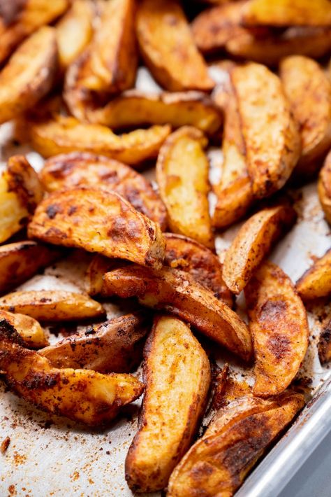 Crispy Baked Potato Wedges | 12 Tomatoes Baked Potato Wedges, Crispy Baked Potatoes, Potato Wedges Baked, 12 Tomatoes Recipes, Traeger Recipes, 12 Tomatoes, Potato Side Dishes, Potato Wedges, Onion Soup Mix