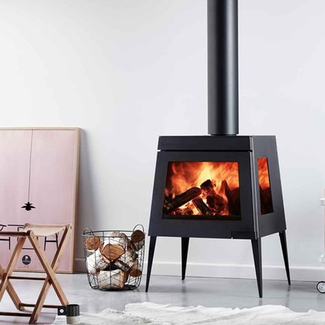 Shopping guide: indoor log fires | Better Homes and Gardens Electric Logs, Contemporary Cabin, Prefab Cabins, Wood Heater, Freestanding Fireplace, Log Fires, Gas Heating, Box Houses, Wood Fireplace