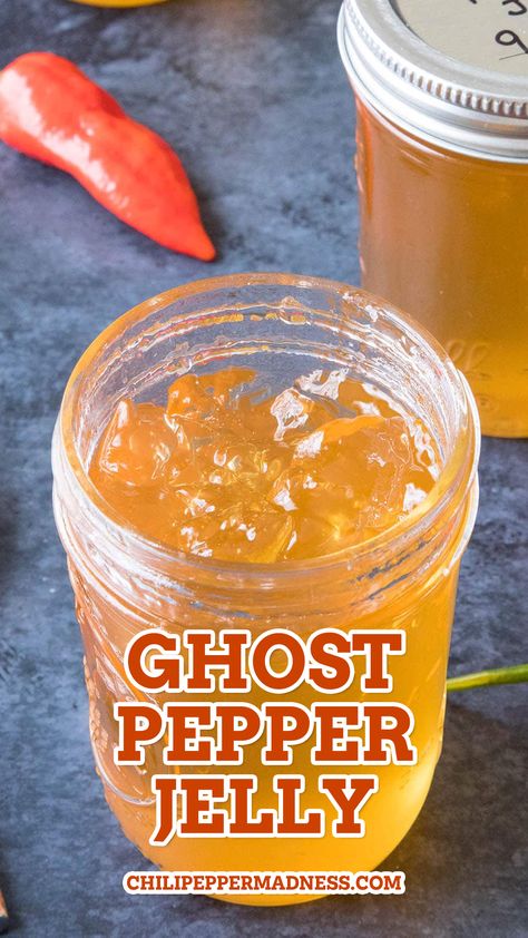 Ghost Pepper Jelly served in a big jar Strawberry Ghost Pepper Jam, Recipes Using Ghost Peppers, Ghost Peppers Recipes, Scorpion Pepper Jelly, Recipes With Ghost Peppers, Hot Pepper Jelly Recipe No Pectin, Sweet And Spicy Pepper Jelly, Canning Ghost Peppers, Pickled Ghost Peppers