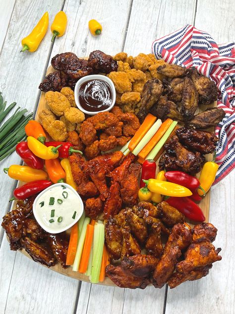 If you are into fun charcuterie boards then you have to try a Chicken Wing Charcuterie Board! Perfect for feeding a crowd at a game or party. Chicken Wings Charcuterie Board Ideas, Charcuterie Board Chicken Wings, Chicken Tender Charcuterie Board, Wing Charcuterie Board Ideas, Chicken Wing Charcuterie Board Ideas, Chicken Wing Charcuterie Board, Wings Charcuterie Board, Chicken Wing Platter, Wing Charcuterie Board