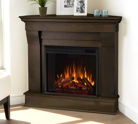 Real Flame® 41" Chateau Corner Electric Fireplace | Pottery Barn Electric Fireplace Mantel, Media Electric Fireplace, Corner Electric Fireplace, Electric Fireplace With Mantel, Stone Mantel, Fireplace Heater, Real Flame, Corner Fireplace, The Chateau