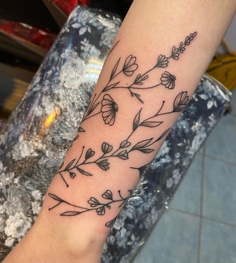 Adding To A Tattoo Ideas, Sleeve Wrap Tattoo, Wild Flower Shoulder Tattoo, Fine Line Floral Arm Wrap Tattoo, Wildflower Wrap Around Tattoo, Sunflower Wrap Around Tattoo, Flower Wrap Tattoo, Forearm Wrap Around Tattoo, Wrap Around Forearm Tattoo