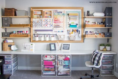 40 Craft Room Design Ideas for Better Organization & Creativity - BigDIYIdeas.com Giant Pegboard, Organized Craft Room, Pegboard Craft Room, Table Organization, Sewing Room Design, Dream Craft Room, Craft Room Design, Sewing Room Organization, Designer Studio