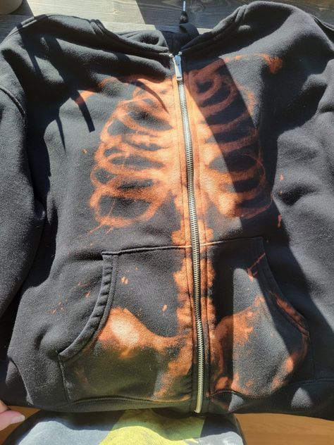 #skeleton #grunge #emo #bleach #diy #aesthetic #loner #hoodie #zip-up #skeletonhoodie #diy skeletonhoodie #grungeskeletonhoodie Bleach Tie Dye Skeleton, Skeleton Sweater Zip Up, Grunge Bleached Hoodie, Black Hoodie Bleach Design, Bleached Hoodie Diy Ideas, Bleach Designs On Shirts Grunge, Bleach Zip Up Hoodie, Grunge Hoodie Outfit, Skeleton Hoodie Aesthetic