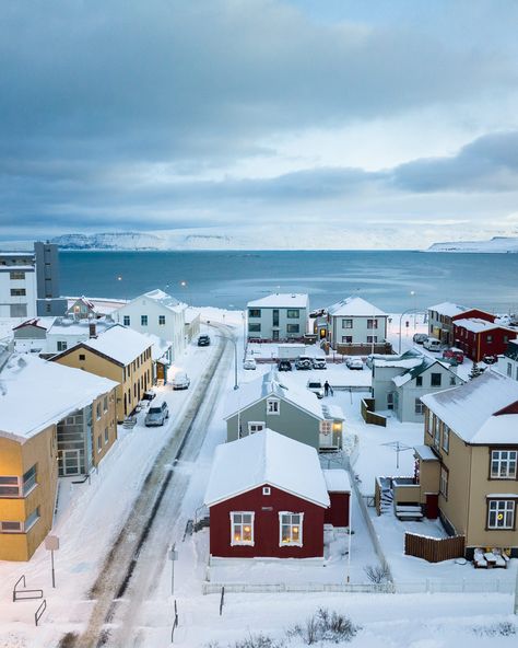 Return of the sun. "The Day of the Sun is when the sun first shines on Sólgata. On that day, I bake pancakes," says Lilja Sigurgeirsdóttir. Lilja lives in a small, red, 120-year-old house on Sólgata 2 (which in Icelandic means ‘sun street’) in the town of Ísafjörður in the Westfjords. Learn more about Lilja and the Return of the Sun at the link in bio. #nordurjournal #iceland Scandinavian Travel, Lego Christmas Village, West Iceland, Scandinavia Travel, In The Town, Travel Outdoors, Iceland Travel, House Landscape, That Day