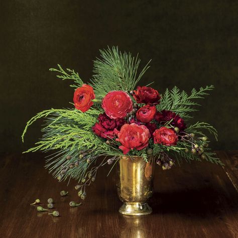 39 Christmas Centerpieces for Your Holiday Table | Southern Living Natal, Amaryllis Christmas, Holiday Flower Arrangements, Winter Floral Arrangements, Red Amaryllis, Festive Centerpieces, Christmas Bouquet, Christmas Flower Arrangements, Christmas Table Centerpieces