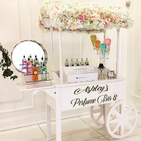 Customize your next event with the addition of a beautiful perfume cart! 🌸💗🌼  Bridal Shower I Baby Shower I Quarantine Bridal shower ideas Perfume Launch Event Ideas, Perfume Bar Set Up Ideas, Wedding Perfume Bar, Perfume Event Ideas, Business Shower Party Ideas, Perfume Bar Set Up, Business Shower Ideas, Perfume Party Ideas, Perfume Booth Design