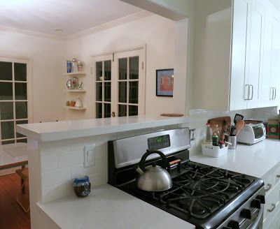 The contractor found these 1939 beer cans in the walls    Between  remodeling Variety  and remodeling my kitchen, blogging at EatingLA  ha... Kitchen Pass Through, Kitchen Pass, Pony Wall, Dining Room Remodel, Kitchen Stove, Kitchen Dinning, Kitchen Remodeling Projects, Kitchen Redo, Room Remodeling