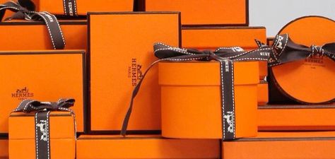 HERMÈS PARIS ~ Signature orange boxes tied with brown ribbon come in all sizes and shapes. Darling Clementine, Hermes Perfume, Hermes Orange, Fashion Packaging, Orange Boxes, Chanel Collection, Hermes Accessories, Orange You Glad, Hermes Box