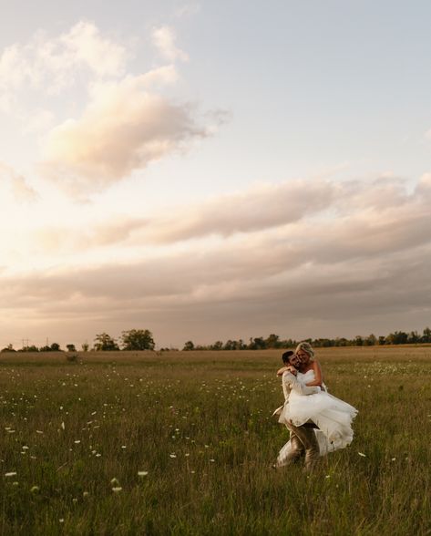 this wedding is my roman empire. happy one year to the Kaminski’s!🕊️  backyard wedding, wedding photos, bride, bridal, etheral couples photos, poses for bride and groom, summer wedding, travel elopement photographer, michigan wedding photographer, golden, cottage core wedding dress, romance, white flowers, documentary photography Bride And Groom Field Photos, Summer Cottage Wedding, Prairie Wedding Photos, Field Wedding Pictures, Open Field Wedding Photography, Wedding Photos In A Field, Wildflower Wedding Photos, Wedding Photos Farm, Micro Wedding Photos