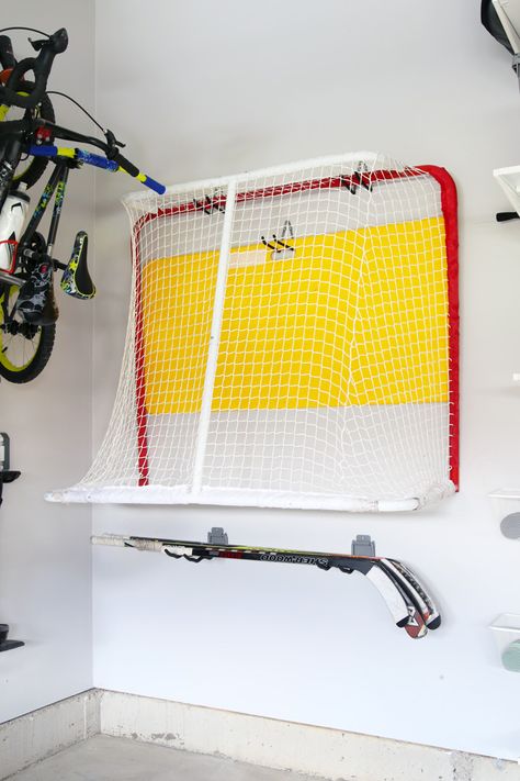 Organizing a garage can feel like a daunting task, but when you have the best storage systems working for you, it doesn't have to be difficult at all! I've rounded up my favorite storage systems for organizing a garage so your next garage project can be an easy one! | #garage #garageorganization #organizedgarage #garagestorage #organization #organized #organizing #organize #hockey #hockeystorage Hockey Equipment Storage, Hockey Room, Hockey Gear, Garage Organization Diy, Garage Remodel, Equipment Storage, Storage Systems, Garage Storage Organization, Hockey Equipment