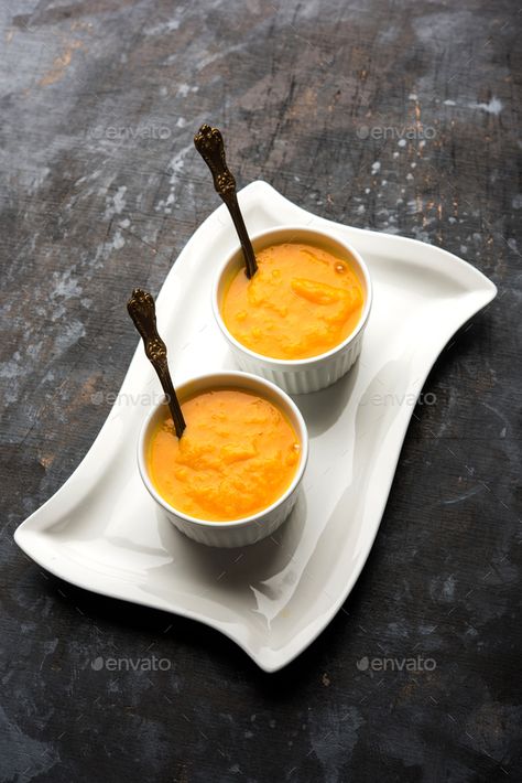 Aamras by stockimagefactory. Mango Pulp or Aam ras or Aamras served in small bowls, selective focus #Sponsored #Pulp, #Aam, #Mango, #Aamras Aam Ras, Mango Pulp, Small Bowls, Mango, Bowl, Tableware, Quick Saves