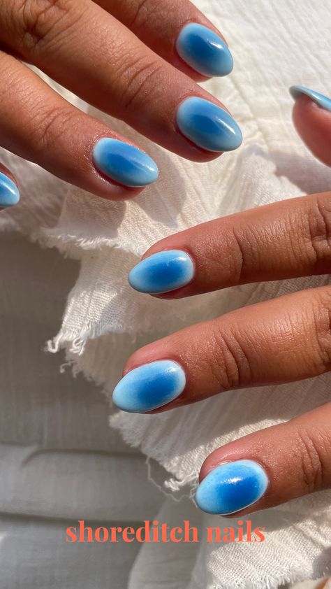 Blue aura nails almond shape nails orb nails blue trending nails trending nail art Small Cute Nail Designs, Short Natural Nail Designs Gel Blue, Single Color Nail Designs, Blue Aura Nails Almond, Blue Bubble Nails, Teal Aura Nails, Winter Aura Nails, Navy Blue Aura Nails, Light Blue Almond Nails Design