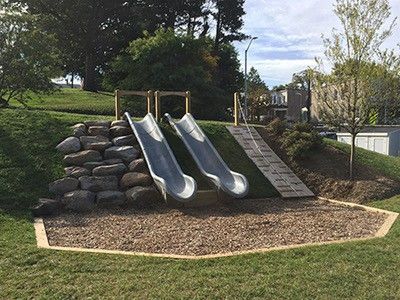 Slide On A Hill, Playground Built Into Hill, Hill Slide Backyard, Natural Outdoor Playground, Backyard Slide, Natural Playgrounds, Sloped Backyard Landscaping, Mathematics Geometry, Kids Backyard Playground