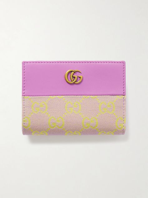 Gucci's wallet has been made in Italy from a combination of canvas-jacquard woven with the brand's iconic 'GG' monogram and smooth leather in a summery pink and yellow colorway. It has numerous slots for storing your cards and cash. Designer Keychain Wallet, Cute Designer Wallets, Cute Wallets For Women, Pink Designer Bags, Gucci Pink, Designer Wallet, Gg Monogram, Eyewear Shop, Cute Wallets