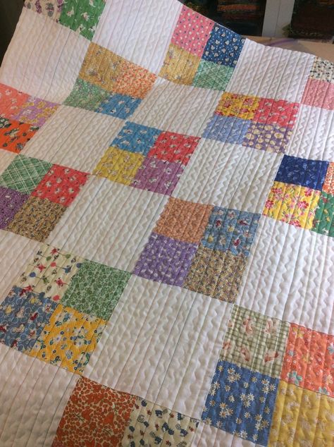 A pretty quilt made for charity.  Love the quilt stitching!  | Mama Spark's World Quick And Easy Quilts Simple, Sew Fresh Quilt Patterns, Quilts Made From Charm Squares, Quilt Patterns For Busy Fabric, All Over Quilting Designs Simple, Fast Quilts To Make, 4 Patch Quilt Patterns Free, Simple Quilts Patterns, 4 Square Quilt Pattern