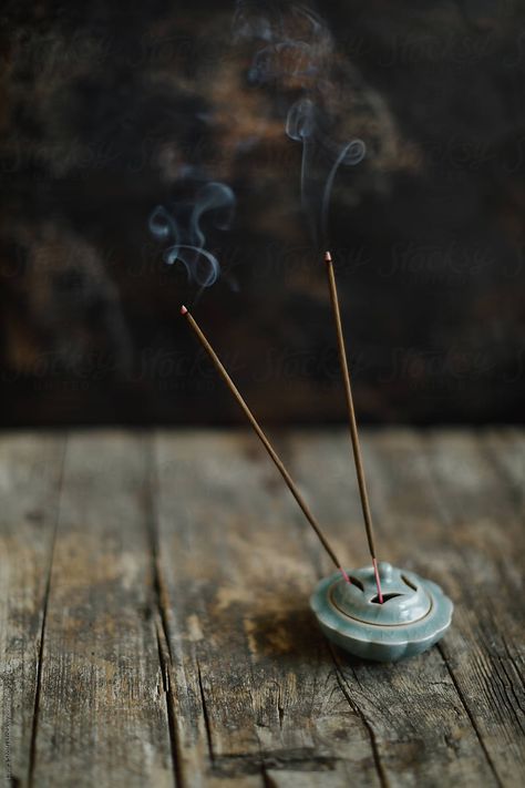 Two incense sticks burning standing in ancient china holder by Laura Stolfi for Stocksy United Incense Photography, Handmade Incense, Sustainable Supply Chain, Burning Incense, Wood Sticks, Yoga Photography, Eco Design, Essential Oil Fragrance, French Vanilla