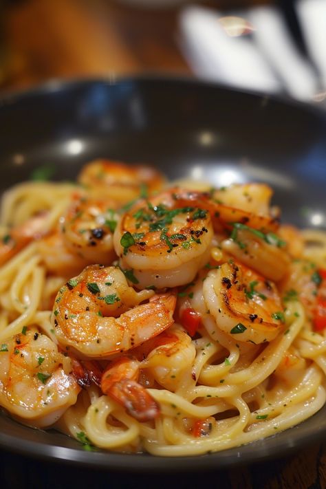 Indulge in a flavorful meal with this exquisite Shrimp Scampi Pasta recipe. With simple ingredients and easy steps, you can create a delicious dinner that is sure to impress your loved ones. The combination of tender shrimp, garlic-infused sauce, and al dente pasta makes for a truly satisfying dish. Whether you're cooking for a special occasion or just craving something tasty, this Shrimp Scampi Pasta is the perfect choice. Garlic Shrimp With Pasta, Shrimp Pasta Scampi, Crispy Shrimp Pasta, Olive Garden Scampi Sauce Recipe, Health Dinner Shrimp, Shrimp And Noodle Recipes Easy, Mccormick Shrimp Scampi Recipe, Pasta With Prawns Recipes, Garlic Prawn Pasta Recipes