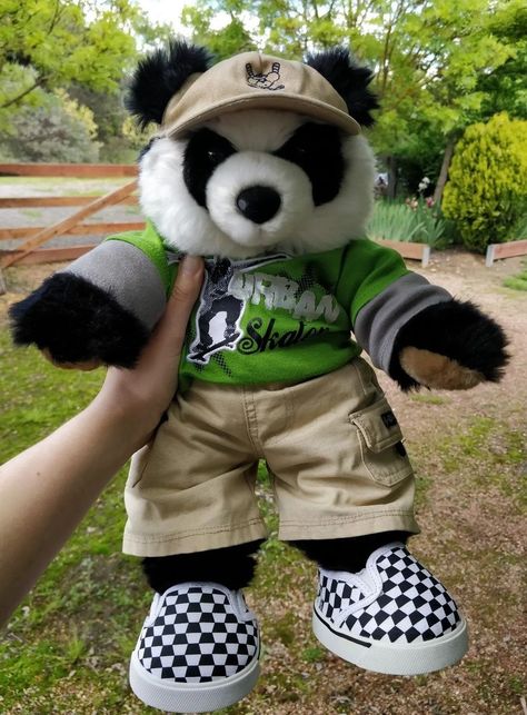 Build a bear panda wearing skater boy style, green tshirt with skateboarder graphic, khaki pants and checkered vans Cutest Build A Bear, Stuffed Animals With Clothes, Build A Bear Outfit Ideas, Cute Build A Bear Outfits, Plushie Outfit, Build A Bear Ideas, Cute Build A Bears, Build A Bear Aesthetic, Stuffed Animal Clothes