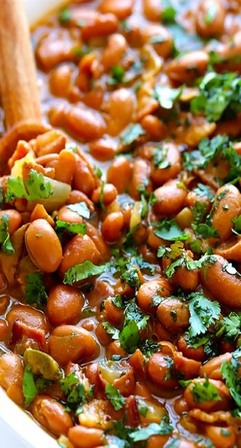 This drunken beans recipe (also known as "frijoles borrachos") is simmered in beer, bacon and seasonings, and comes together in just 30 minutes! Drunken Beans, Mexican Side Dishes, Beans Beans, Pinto Beans, Side Recipes, Edamame, Bean Recipes, Mexican Dishes, Mexican Recipes