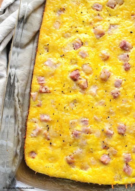 Easy Ham Egg and Cheese Casserole Spam And Egg Casserole, Ham Scrambled Eggs, Ham Egg And Cheese Casserole Overnight, Ham Egg And Cheese Breakfast Sliders, Breakfast Ideas To Reheat, Ham Eggs And Cheese Casserole, Overnight Ham And Cheese Egg Bake, Eggs And Ham Casserole, Eggs Ham Cheese Breakfast