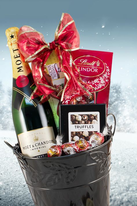 Celebrate with champagne gift baskets! Champagne Gift Basket Ideas Diy, Champagne Gift Basket, Cristal Champagne, Holiday Wine Gift, Chocolate Gift Baskets, Champagne Collection, Champagne Truffles, Moet Chandon Champagne, Champagne Chocolate