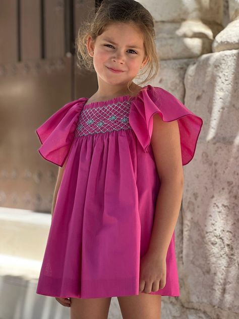 Girls gorgeous hot pink summer dress with smocked detail across the chest by El Copo for Summer. No Returns on Clearance Sale. Spanish sizing runs smaller than UK so we advise to go up a size. Pink Dress Toddler, Hot Pink Summer Dress, Pink Toddler Dress, Kid Dress, Boy Dress, Hot Pink Dress, Frock Fashion, Pink Summer Dress, Baby Knitwear