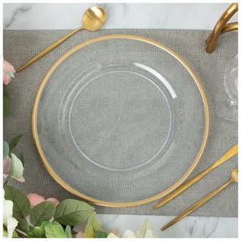 Diameter: 13" Material: Plastic Color: Clear & Gold Care & Safety: Not Intended For Food Use Quantity: 1 Create a unique and dynamic table setting when you use this Charger Plate With Gold Rim. This clear charger plate has a shallow well in the center with a metallic gold rim around the outer edge. Use this piece as a decorative base for your dinner plate and coordinate with matching tableware for an elegant arrangement.   *No discounts may be applied to "your price" or "reduced" items. Gold And Silver Charger Plates, Dark Green Charger Plates, Clear Plates With Gold Trim, Gold Rimmed Charger Plates, Clear Chargers With Gold Trim, Wedding Plates And Silverware, Thanksgiving Table Settings Elegant Gold, Silver Thanksgiving Table Decor, Sage And Gold Table Setting