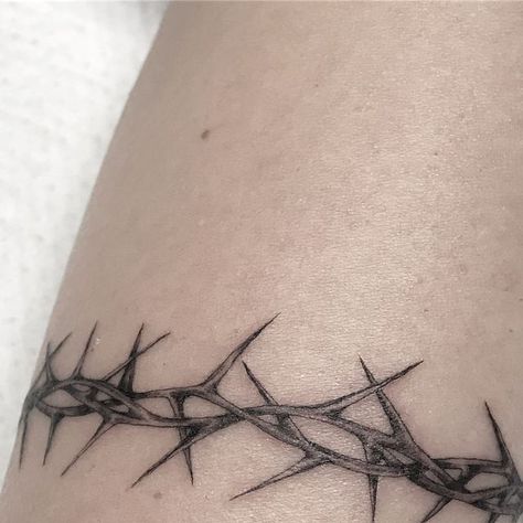 Crown of Thorns Tattoo Forehead Crown Of Thorns Ring Tattoo, Thorn Hip Tattoo, Collar Bone Tattoo Thorns, Thorn Tattoo Wrist, Barbwire Arm Band Tattoo, Thorns Around Wrist Tattoo, Crown Of Thorns Wrap Around Tattoo, Thorn Of Crowns Tattoo, Thorn Vine Tattoos For Women