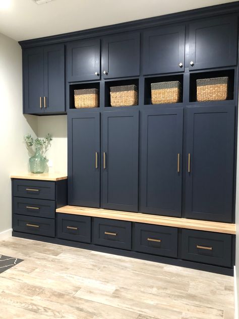 Custom built-in lockers in for drop zone area. C&E Builders used Benjamin Moore Hale Navy for the color and finished the hardware off with Berenson modern bronze swagger. Mudroom With Dark Cabinets, Mudroom With Counter Space, Storage Cabinet With Counter, Large Mudroom Cabinets, Navy Blue Mudroom Cabinets, Cabinet Drop Zone, Mudroom Lockers With Drawers, Shallow Mudroom Storage, Navy Mudroom Cabinets