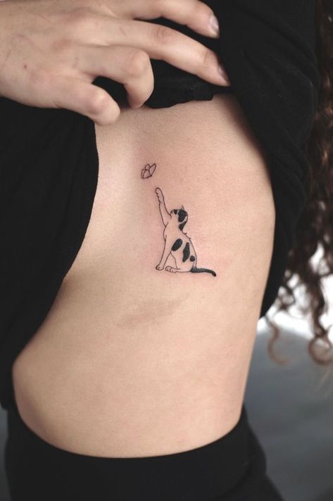 Cat Playing With Flower Tattoo, Multiple Cat Tattoo, Cat Line Art Tattoo, Angel Cat Tattoo, Black And White Cat Tattoo, Tattoo Designs Cat, Small Quirky Tattoos, Minimal Cat Tattoo, Tiny Cat Tattoo