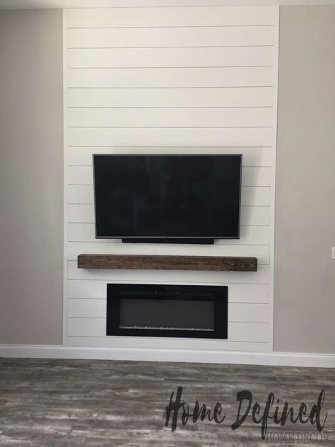 Defining your living room with a farmhouse DIY shiplap accent wall does not have to be costly or difficult. Learn how to make your own faux shiplap from plywood and create an easy and affordable statement wall for any room in your home.    When we first closed on our house, I knew that even though it was newly built, many upgrades needed to be done in order to make it feel like home. We decided that the first room we needed to define was our living room w… Flat Wall Fireplace Ideas Shiplap, Shiplap Fireplace Flush With Wall, Shiplap Tv Accent Wall Without Fireplace, Shiplap Fireplace Tall Wall, Shiplap Faux Fireplace Wall, Flat Shiplap Fireplace Wall, Interior Siding Ideas, Shiplap Tv Accent Wall Living Room, How To End Shiplap On Open Wall