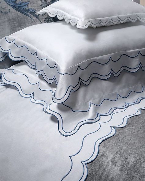 Be transported to the French Riviera every night when sleeping in the blue waves of our St. Malo bedlinens. | Dea Italian Linens Embroidery Bedding, Scallop Design, Luxury Hotel Room, The French Riviera, Linen Sheets, Make Your Bed, Fine Linens, Cotton Set, Luxury Linen