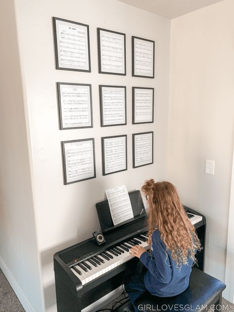 Simple and personalized wall art above the piano. Framed sheet music in dollar store frames that add a personal touch. Decorating With A Piano, Pictures Above Piano, Above Piano Wall Decor, Easy House Projects, Piano Wall Decor, Framed Sheet Music, Sheet Music Decor, Piano Room Decor, Inexpensive Wall Art