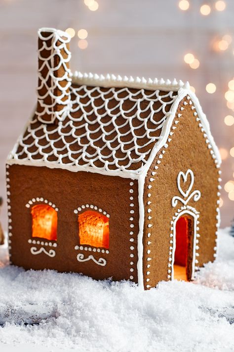 This dainty, pretty Swedish-style gingerbread house is so charming you'll want it to last all season long. | Tesco Swedish Gingerbread, Gingerbread House Recipe, Gingerbread House Template, Royal Icing Sugar, Gingerbread House Designs, Prize Draw, Tesco Real Food, Gingerbread Recipe, Swedish Christmas