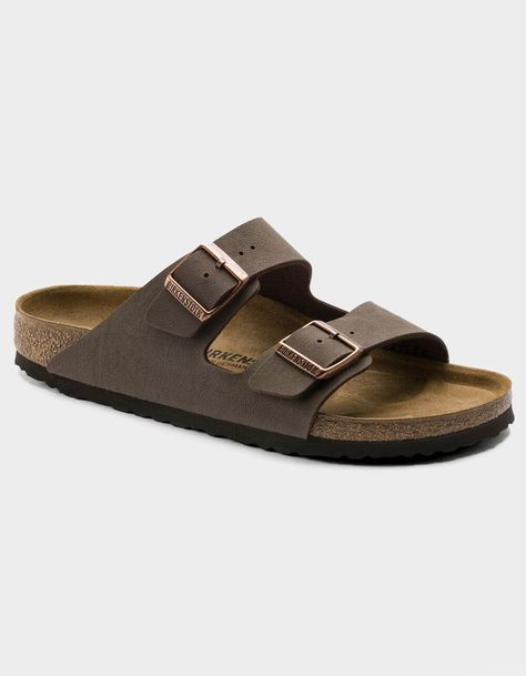 Birkenstock Arizona Sandals. The Often Imitated, Never Duplicated, Category-Defining, Two-Strap Wonder From Birkenstock. A Comfort Legend And A Fashion Staple. With Adjustable Straps And A Magical Cork Footbed That Conforms To The Shape Of Your Foot, A Truly Custom Fit Is As Effortless As The Classic Design. -narrow Width (fits Like A Us Medium Width) -birkibuc – A Durable, Synthetic Upper Material With A Nubuck Leather-Like Texture And A Soft Backing -contoured Cork Footbed Conforms To The Shape Of Your Foot And Features Pronounced Arch Support, A Deep Heel Cup, And Roomy Toe Box; Lined With Suede -lightweight Eva Sole For Cushioning And Shock Absorption -avoid Extreme Heat -imported | Birkenstock Arizona Mocha Sandals Burken Stocks Shoes, Birkenstock Mocha, Birkenstock Arizona Mocha, Birkenstock Slippers, Unisex Sandals, Birkenstock Sandals Arizona, Birkenstock Sandals, Extreme Heat, Kids Sandals