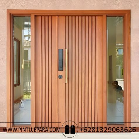 Model Pintu Minimalis dari Kayu 2 Pintu Pintu merupakan salah satu elemen penting dalam desain rumah. Selain berfungsi sebagai pengaman dan pembatas ruangan, pintu juga memiliki peran estetika yang tidak bisa diabaikan. Salah satu model pintu yang sedang populer saat ini adalah pintu minimalis dari kayu dengan 2 pintu. Pintu minimalis dari kayu 2 pintu memiliki tampilan yang simpel namun elegan. Desainnya yang sederhana membuatnya cocok untuk berbagai tipe rumah, mulai dari rumah tradisional Main Door Designs, Pintu Ganda, Main Doors, Door And Window Design, House Main Door, Flush Door Design, House Front Door Design, Modern Entrance Door, House Main Door Design