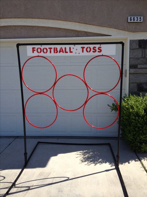 Football Toss school carnival game. Frame made out of pvc pipe and the rings are hoola hoops zip tied to frame. The kids loved it! Carnival Games Halloween Theme, Carnival Party Games Diy, Town Festival Ideas, School Carnival Booth Ideas, Easter Carnival Games, Diy Carnival Games For Kids, Cheap Carnival Games, Easter Carnival, School Carnival Games