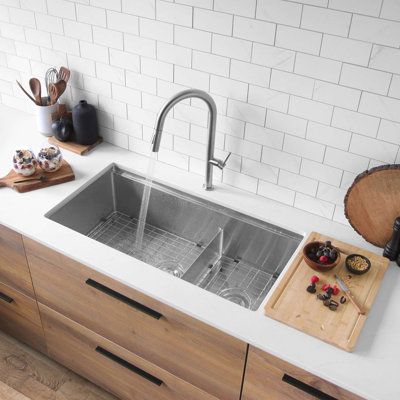 This extra-large double bowl workstation sink revolutionizes the way you work in the kitchen. Inspired by professional kitchens and designed for the modern home chef, our VERSA36 workstation sink transforms your kitchen sink into a multifunctional hub for culinary creativity.Crafted from durable 16-Gauge stainless steel, this sink features refined 10mm rounded corners and a seamlessly integrated ledge system. With a slim and low divider offering a 60-40 split and a generous 10" depth, it accommo Large Basin Kitchen Sink, Double Sink Kitchen, Sink Remodel, Stainless Steel Double Bowl Kitchen Sink, Large Kitchen Sinks, Workstation Sink, Sinks Kitchen, Double Kitchen Sink, Modern Kitchen Sinks