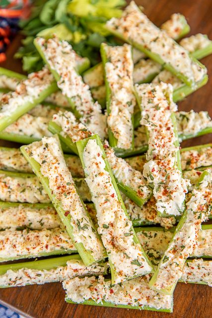 Italian Cream Cheese Stuffed Celery - outrageously good with only 5 ingredients! A party favorite! Can make in advance and refrigerate until ready to serve. Celery, cream cheese, Italian dressing mix, mayonnaise, and mozzarella cheese. This is always the first thing to go! Great for game day, parties, potlucks, and the holidays! #celery #appetizer #gameday #thanksgiving #christmas #stuffedcelery Cold Vegetable Appetizers, Cream Cheese Dressing For Salad, Ballgame Food Ideas, Appetizers For Diabetics, No Meat Appetizers, Celery Dip Cream Cheese, Stuffed Celery Appetizers, Italian Cream Cheese Stuffed Celery, Celery Appetizers Stuffed