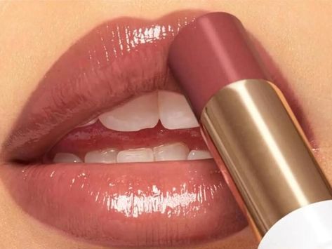 Revlon Just Transformed Their Iconic Rum Raisin Lipstick into a $10 Tinted Lip Balm - NewsBreak Revlon Rum Raisin Lipstick, Rum Raisin Lipstick, Revlon Rum Raisin, Raisin Lipstick, Revlon Super Lustrous Glass Shine, Blush Ideas, Loreal Lipstick, Nude Pink Lipstick, Mauve Lipstick