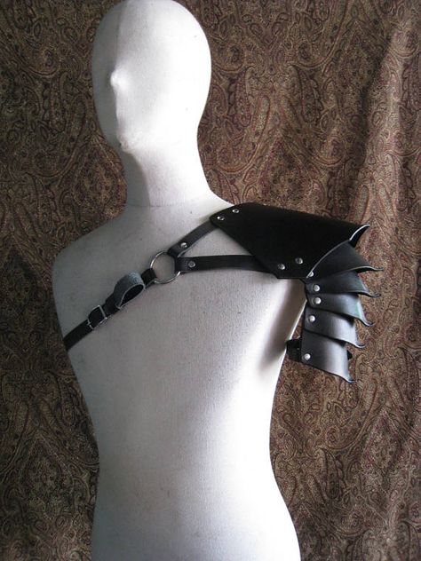 This is a unisex all leather armor piece that sits on the shoulder. It is sold individually and has buckle on both side so it can be worn on either shoulder. The leather shoulder plates are articulated to allow movement of the arm. This size is fits all, but proportionally large Cenobite Fashion, Armour Fashion, Leather Pauldron, Shoulder Plate, Shoulder Harness, Armor Plate, Arm Guard, Shoulder Armor, Leather Armor