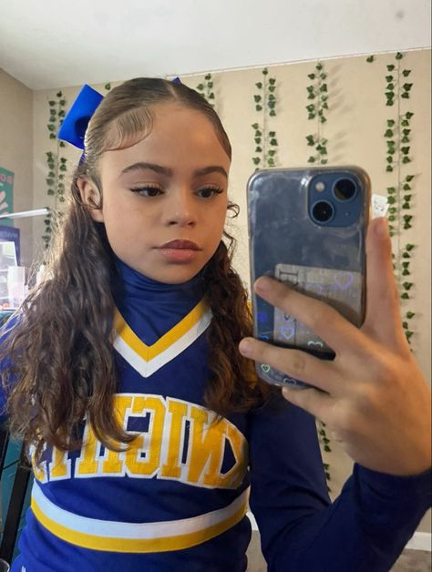 Cheerleading Half Up Half Down Hair, Cheerleading Hairstyles Curly Hair, Curly Hair Cheerleader, Curly Hairstyles For Cheerleaders, Half Up Half Down Hair Cheerleading, Cheer Half Up Half Down Hair With Bow, Basketball Cheer Hairstyles, Low Half Up Half Down Cheer, Drill Team Hairstyles