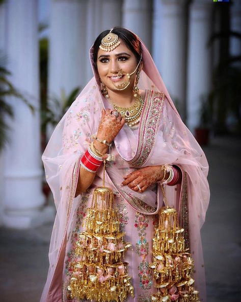 Indian bridal kaleere | Tassel bridal kalire | Sikh bride | Pink sikh bridal outfit | Kalire designs | Pink bridal outfit | Source: kohlesbyjo | #indianwedding #kalire #indianweddingbuzz #kaleerein #sikhbride #bridaljewelleryindian #indianjewelry #indianweddingblog #weddinghairstyles #indianbridalmakeup #indianbride #sikhwedding #tassels #indianbridalfashion #wittyvows #indianbridalmakeup Lehenga Colours, Kalire Designs, Real Flower Jewellery, Bridal Chura, Bride Pictures, Royal Beauty, Punjabi Bride, Royal Brides, Indian Brides