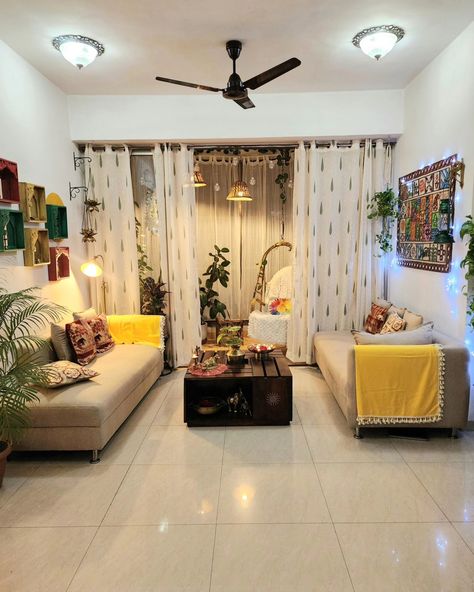 Long........ weekend 🏡❤️✨️ Balcony curtain @ikea.india Loving room curtains and yellow throw @urbanspacestore.in Coffee table . Floor lamp . White throw @amazonhomeindia Wall decor @pepperfry_official Lotus hanging . Elephant show piece @homecentreindia Cushion covers @indiacircus Beaded placemat @sajjadecor Brass nandi @mypoojabox Urli @behomaindia Indian homedecor .. Interiorideas. Living room .plants. brassdecor #indianhome #indianhomedecor #homedecor #decorideas #houseplants... Living Room Indian Decor, Indian Curtains Living Room, Indian Drawing Room, Ikea India, Lotus Hanging, Indian Living Room Decor, Living Room Indian, Balcony Curtains, Indian Curtains