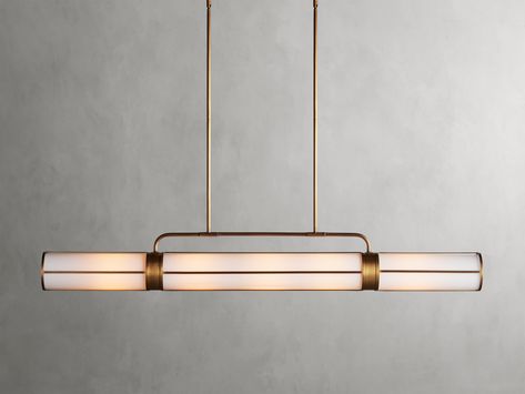 Modern sophistication ideal for dining tables and kitchen islands-our exclusive Remming Lighting Collection features linear milk glass tubes and contrasting finish details that come together to create an elevated, industrial-chic aesthetic.