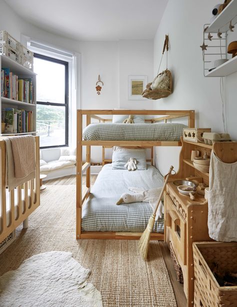 Kids Room With Rug, Natural Bed Frame Ideas, World Market Bedroom, Modern Cottage Guest Room, Room With Crib And Bed, Living Room With Corner Windows, Two Bed Kids Room, Earthy Kids Bedroom, Natural Kids Room